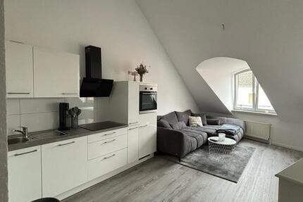 Neuwertige Wohnung im Dachgeschoss 2 zimmer