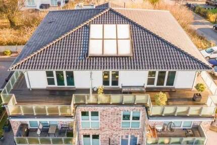 Scharbeutz - helle 3-Zimmerwohnung mit Terrasse und Garten, 