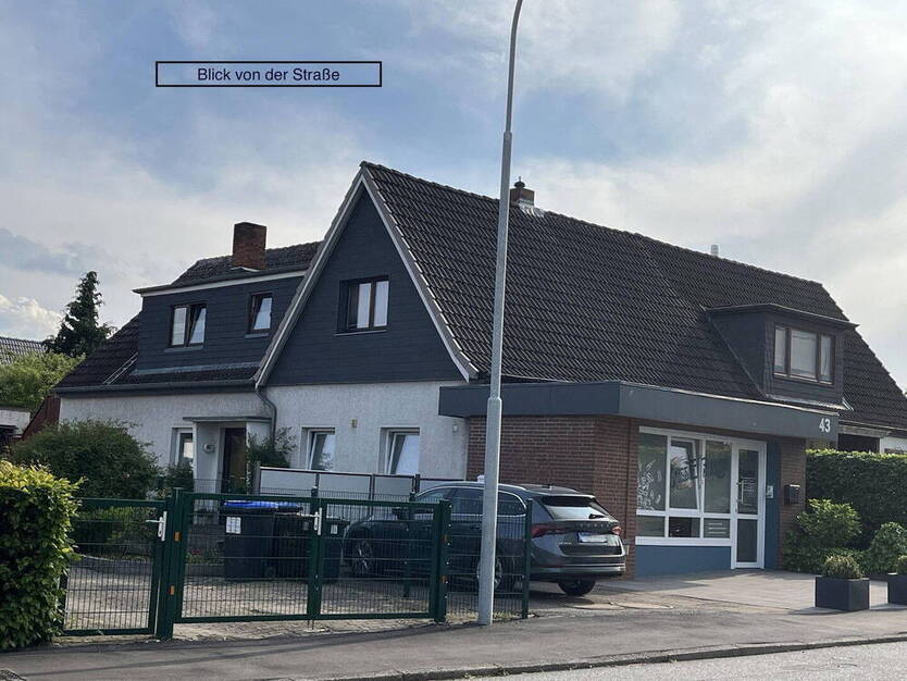 DHH mit Gewerbeeinheit und EinliegerWohnung in Travemünde