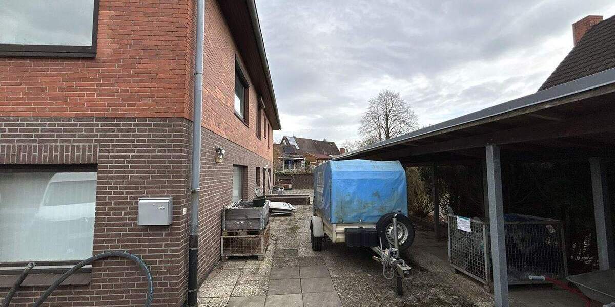 Rarität: Großzügiges, vollunterkellertes EFHZFH mit Doppelcarport und 5 Garagen in Lübeck-Kücknitz 8 zimmer