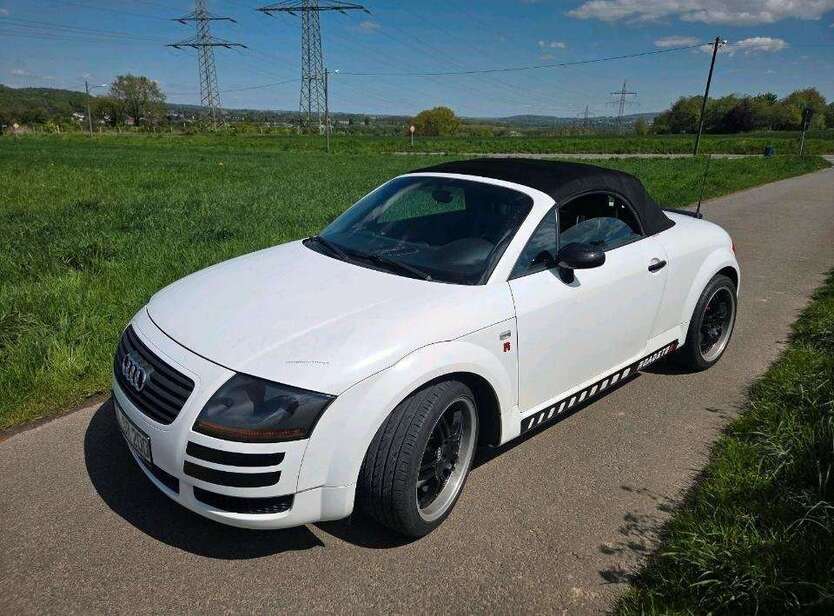 TT