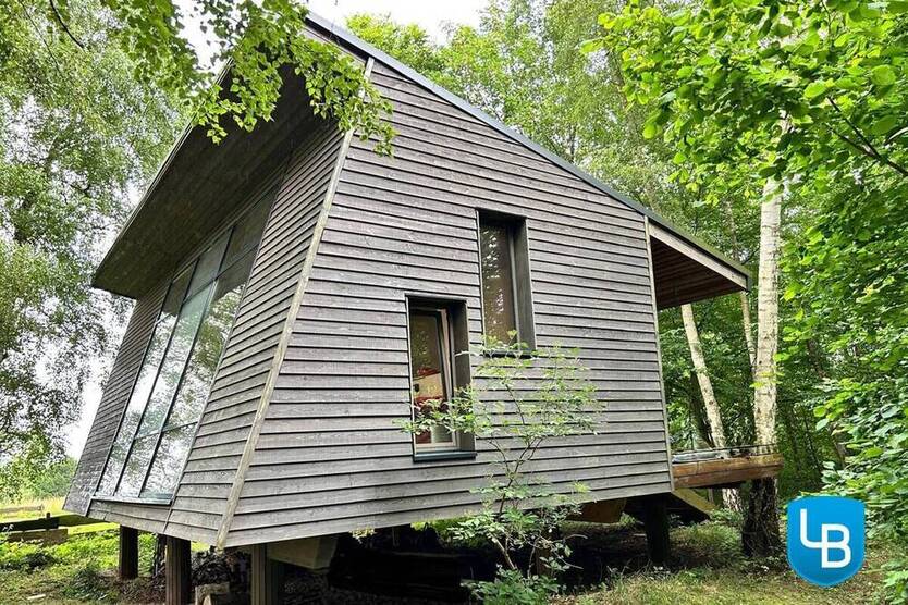 Architektonisch beeindruckendes Tiny House auf großzügigem Baugrundstück für Ihr Einfamilienhaus